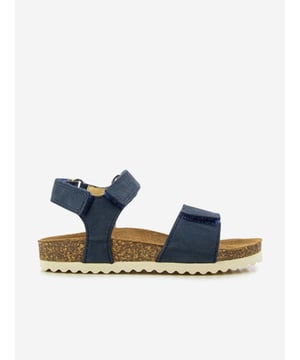 Introducing the Kids Leather Groot Bi-Easy Sandals in Navy Blue by Pom D Api! A chic addition to your Unisex wardrobe, perfect for lively Holiday adventures. Here are its stand-out features:Unique Design: The stylish Groot prints adds a playful touch, turning this into a statement footwear. Premium Comfort: Crafted from premium leather, these sandals assure exceptional comfort for your child's day-to-day explorations.Reinvent your Unisex wardrobe! The Groot Bi-Easy Sandals in Navy Blue is a trending must-have. Elevate your child's style game! Order now before it's gone!