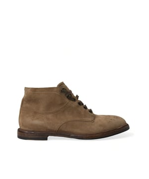 Botines 100% autenticos de Dolce & Gabbana.
  Suela exterior de cuero marron.
  Cierre con cordones.
  Fabricado en Italia.
  Detalles del logotipo.
  Alta artesania.
  Perfecto para hombres a la moda.