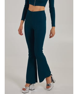 Want to be low-key but still stylish? Grab our Wide Ribbed Flare Trousers and stay on-trend this season. Whether you're going on a cinema date, or just chilling at home, this co-ord is this season's wardrobe winner.