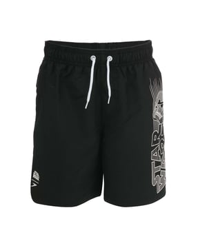 Junior Boys Speedo Star Wars Swim Short in black- white.- Drawstring waistline.- Back pocket.- Shape retention.- Mesh lining.- Sun protection - UPF 50+.- Body: 100% Polyester. Lining: 100% Polyester.- 809067C629JPlease note that returns will only be accepted if the hygiene label is still attached to the product.