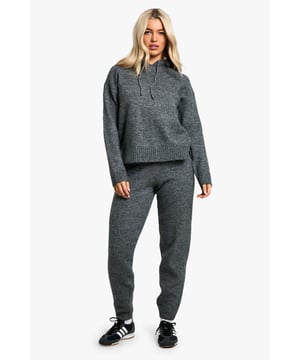 Cosy fine-knit tracksuit for ultimate comfort
        Hoodie features a relaxed fit with ribbed cuffs and hem
        Matching trousers with tapered leg for a sleek silhouette
        Versatile two-piece set for mix-and-match styling
        Soft-touch fabric blend for warmth and flexibility
    
    Embrace laid-back luxury with this fine-knit tracksuit, perfect for those days when comfort is key. The relaxed-fit hoodie pairs seamlessly with the tapered-leg trousers, creating a coordinated look that's both stylish and practical. Ideal for casual outings, this versatile set can be dressed up or down to suit your mood. Layer the hoodie over a simple tee and pair the trousers with trainers for a quick coffee run, or wear the set together for a cosy night in. For a sportier vibe, team the trousers with a cropped top and add a denim jacket for an effortless street-style ensemble. The soft-touch fabric ensures all-day comfort, making this tracksuit a go-to choice for weekend lounging or casual catch-ups with friends.
