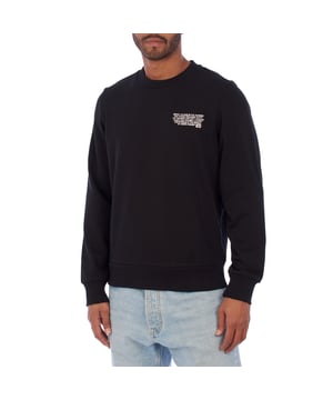 Das normal geschnittene Sweatshirt der Marke Diesel für Herren besteht aus hochwertigem Baumwolljersey, der bei jedem Gebrauch Weichheit und Komfort bietet.

 Der Aufdruck „Diesel Holiday“ sowie das „D“-Emblem auf der Brust und dem Rücken verleihen ihm einen modernen und unverwechselbaren Stil.

 Das Design umfasst einen Rundhalsausschnitt, lange Ärmel und gerippte Details an Bündchen und Saum, die für eine bequeme Passform sorgen und gleichzeitig warm halten.

 Dieses Sweatshirt eignet sich perfekt für einen lässigen Look und lässt sich leicht mit Jeans oder Sporthosen kombinieren, was für einen Hauch von Stil und Raffinesse sorgt.
 Komposition: 60 % Baumwolle, 40 % Polyester
 Pflege:
-Maschinenwäsche max. 30 °C.
 - Vermeiden Sie die Verwendung von Bleichmitteln.
 - Vermeiden Sie die Verwendung eines Trockners.
 - Bei niedriger Temperatur bügeln.