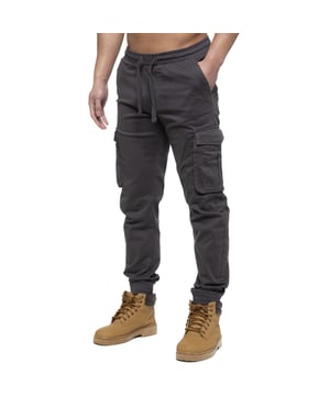 Enzo Mens Elasticated Waist Stretch Cuffed Jeans. Features a 5 Pocket Design. 2 Slash Pockets, 1 Back Pocket 2 Front Cargo, Bellow Side Pockets With Velcro Fastening. Elasticated Waist With Adjustable Drawstings. Cut and Sew Design On Leg. Cuffed Ankle