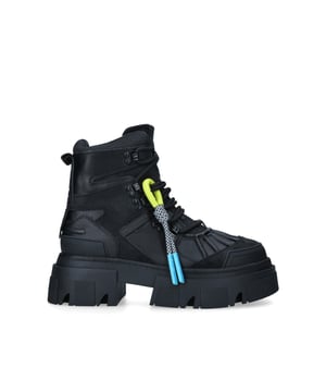The Trekker Pumped Hiker boot features iconic branding across the upper. KG Kurt Geiger logo printed on ribbed textile with print stitch detailing can be seen at the tongue as well as a black rubber monocle on the heel.