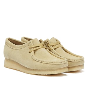 Launched in 1964, the moccasin-inspired Wallabee, with its clean and simple lines, has become an iconic Clarks design. Crafted from premium suede this classic design features a distinctive crepe sole along with a 2-eye lace-up fastening .