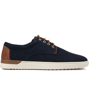 Descubra Hush Puppies Joey, donde la comodidad se une al estilo atemporal. Perfectos para el freestyler moderno, estos zapatos con cordones azul marino cuentan con una parte superior de gamuza suave, suela de goma duradera y una plantilla cómoda para estar cómodos durante todo el día. Acentuados con una lengüeta de cuero en el talón y la marca distintiva, son el epítome de la sofisticación diaria y la tranquilidad del fin de semana.