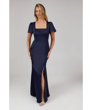 Elegant square neckline for a sophisticated look
        Graceful angel sleeves add a touch of romance
        Figure-flattering fitted bodice
        Dramatic side slit for ease of movement
        Floor-sweeping maxi length for a grand entrance
    
    Make a striking impression as part of the bridal party in this stunning Debut London by Coast maxi dress. The satin fabric drapes beautifully, creating a sleek silhouette that's perfect for formal wedding celebrations. The square neckline and angel sleeves offer a modern twist on classic bridesmaids' attire, while the side slit adds a touch of allure. Style with strappy metallic sandals and delicate drop earrings to complete your look. For a coordinated bridal party, consider pairing this dress with complementary styles in the same rich hue, allowing each bridesmaid to shine while maintaining a cohesive aesthetic. This dress is designed to make you feel confident and radiant as you support the bride on her special day.
