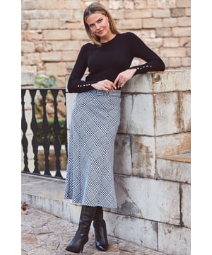 REASONS TO BUY:

Skirts are trending this season
Timeless dogtooth check - it's a wardrobe classic
Bias cut ensures it hangs beautifully
High waist, cinching belt - it doesn't get more flattering
You'll wear it for work and play
Gorgeous with ankle boots and a cosy knit