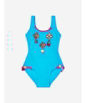 Introducing the Selini Action Girls Boho Swimsuit in Blue, an exquisite addition to SS2024's youth fashion. Perfect for adding a splash of style and comfort to any girl‚ wardrobe, it boasts: Eye-catching Bohemian Design: Features vibrant boho patterns that capture the essence of youthful spontaneity. Luxurious Comfort: Crafted with premium, soft fabrics ensuring all-day comfort and durability for playful activities. Perfect Fit: Tailored to provide a snug, yet comfortable fit that moves with your little one.Revitalize her swim collection with the Selini Action Girls Boho Swimsuit. Shop now and make her summer unforgettable!