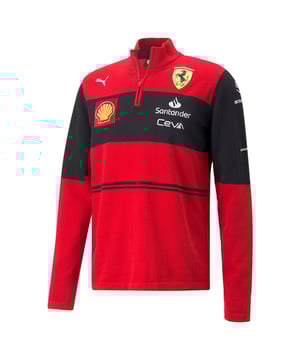 PRODUCT STORY Wear your passion for Scuderia Ferrari with pride in this Half-Zip Knitted Sweatshirt, inspired by team colours. Its bold colour-blocked design echoes Scuderia Ferrari's historic racing suits, while the graphic draws on Scuderia Ferrari’s Gestione Sportiva building in Maranello to add a modern twist. Worn on the grid by the Scuderia Ferrari team during the 2022 Formula 1™ season, this sweatshirt was designed for true fans like you.DETAILS .Half-zip closure systems with high collar.Long sleeves.Scuderia Ferrari and PUMA branding