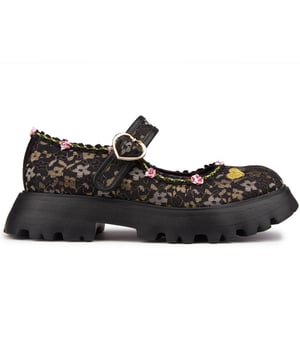 Lightweight And Romantic, These Black Mary-jane Shoes Sweet Surprise By Irregular Choice Are The Ideal Addition To Your Spring Outfits. For The Ultimate 90's Trend Look Wear With A Maxi Skirt Or Flared Trousers And Matching Tank Top And Cardigan Combo. Buckle Up These Chunky Tread Flats And You're Good To Go!