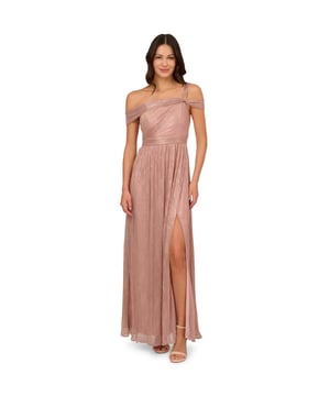Take the spotlight in this dreamy metallic gown. This formal dress features a shirred bodice with an asymmetrical neckline, draped shoulder sleeves and a single strap at one side, and a side slit cut out of the soft skirt. Crafted from crinkle metallic fabric, this evening gown is fully lined. A zipper closure at the centre back completes the design. Nude heels and a beaded clutch are the perfect accessories to complete this dress for formal and black-tie events.