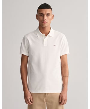 For impromptu tennis matches and alfresco dining to casual Fridays and everything in between �the versatile piqu� polo shirt is a staple for a reason (meaning you can justify one in every color). Our polo shirt keeps it easy, simple, and classic. With a slim fit and a traditional flat knit collar, details include a two-button placket, small side slits, and our signature GANT logo embroidered at the chest.
Slim fit  Flat knit collar  GANT graphic embroidered at chest
&nbsp;
2220
&nbsp;