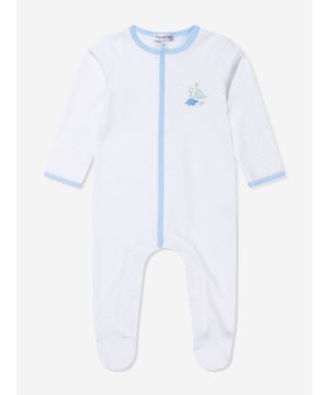 Introducing the 'Baby Boys Dinoland Embroidered Babygrow in White' by Magnolia Baby, designed exclusively for your baby boy's wardrobe. Listed are reasons for it to be a must-have: Stylish Design: Its trendy dinosaur print adds playfulness and an element of fashion appeal making it a distinct piece.  Optimal Comfort: Crafted from superior materials, it ensures ultimate comfort for your baby, perfect for daily wear.  Elevate your Baby Boy's wardrobe with this sophisticated Babygrow. Grab it now for your little one to shine in style!