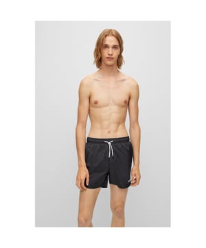 Signature swim shorts with full lining, by HUGO. Crafted in lightweight fabric with quick-drying performance, these swim shorts are detailed with branded drawcords and a contrasting HUGO logo.
Elastic waistbandDrawstringPockets bottom front: Side pocketsMedium length
100% Polyamide, Lining: 100% Polyester
50469312