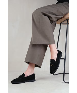 Stay effortlessly stylish and comfortable with our Women's Slider Loafers with Accessory detailing. These slip on sliders are the perfect addition to your wardrobe, offering both versatility and elegance. Crafted with a cushioned insole for all-day comfort and a rubber outsole for added traction, these slip on daily shoes will be your go-to for both casual and formal occasions.

Specifications:

Material: Faux Suede
Colour:  Beige
Size Options: Available in multiple sizes
Closure: Slip-on
Sole: Rubber sole for comfort and traction

Invest in our loafer sliders and experience the perfect blend of style, comfort, and durability. Stay fabulous and make a fashion statement with every step you take.
Where's That From crafts footwear with the utmost care with YOU in mind. Our in-house unique designs offer the latest trends with supreme luxury comfort and unparalleled quality.