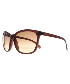 Las gafas de sol Calvin Klein Cat Eye Womens Milky Brown Brown Gradient CK19565S presentan un moderno estilo cat eye elaborado en acetato ligero. El logotipo de Calvin Klein aparece en las finas patillas para garantizar la autenticidad de la marca.