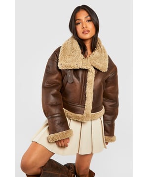 Keep toasty this season with our collection of petite coats and jackets. From petite trench coats to petite teddy coats, our coats for petite women are specifically designed to fit all you girls sitting pretty at 5'3'' and under. Step out in a petite blazer or pass the vibe check in a petite puffer jacket. Whatever your style, we've got you, girl. This one would look dreamy with a pair of straight leg jeans, an oversized hoodie and chunky trainers.Style: Aviator JacketFabric: PULength: RegularSleeve Length: Long Sleeve