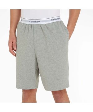 Mens Calvin Klein Lounge Shorts in grey.- Branded elasticated waistband.- Regular fit.- Ref: 000NM2303EP7A
