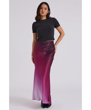 Model is 5'6 and wears a size 8. Ombre Pattern, Bias Cut, Maxi Length. Introducing our new Ombre Bias Cut Maxi Skirt in a stunning purple shade, following the success of the blue version that you loved! With its flattering bias cut, this skirt drapes beautifully and creates a timeless, flowy silhouette perfect for any occasion.