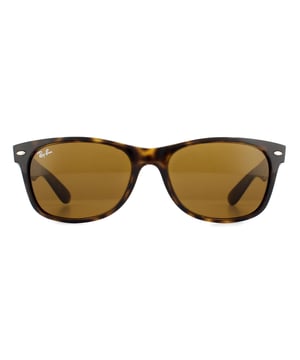 Ray-Ban Sunglasses New Wayfarer 2132 710 Light Havana Brown 52mm are an updated and slightly smaller interpretation of the Original Wayfarer. They feature a softer eye shape and sculpted temples that display the iconic Ray-Ban logo. The New Wayfarer 2132 are a versatile and playful choice that are available in countless colourways and the lightweight acetate frame is comfortable and easy to wear. The softer style of the 2132 suit more face shapes and is perfect for somebody that loves the Original Wayfarer design but is looking for a less dramatic look..