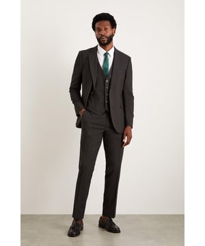Introducing our slim fit charcoal essential suit trousers for men, perfect for any formal occasion. The trousers can easily be paired with our charcoal essential suit jacket for a complete formal outfit. Made with high-quality materials, these trousers are durable and comfortable to wear. Elevate your style with our slim fit charcoal essential suit trousers.