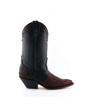 Featuring hand crafted premium leather on the upper and on the inner lining, this pair of boots offers a great amount of style and comfort. A high-quality detailed pattern is stitched on to the upper and burgundy accenting panels, as well as a small block heel that compliments the high boot design. This boot was manufactured with a Grinders proprietary sole unit, that has been heat bonded to the welt using the Goodyear method, which is known for increasing the strength of the boot and ensuring durability for years to come. The sole is also fitted with a unique air cushion that allows for added flexibility and which adds to the long-lasting qualities of this boot. • Leather upper • Goodyear Welted • Luxurious interior leather lining • Stacked leather heels • Leather Soles • Made in Mexico