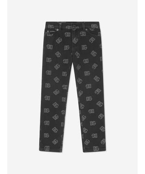 Dolce  Gabbana incorporate innovative materials with vintage abstracts into coexisting spaces. These girls jeans capture the Italian label's mesmeric craftsmanship and purity of design. Crafted in immaculate stretch cotton via a monogram jacquard perspective, silver-tone logo plaque and traditional five pockets. Rivet Detailing Mid-Rise Belt Loops Skinny Cut Concealed Fly and Button Fastening Cotton 98%, Spandex/Elastane 2%