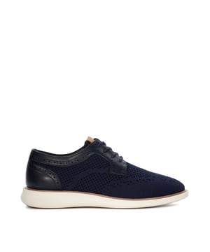 Our Barrow hybrid derby features five-eyelet lacing, a contrasting back pull-on tab for added convenience, and perforated panels to allow airflow. Set upon a visible wedge sole for a contemporary look and added comfort, Barrow will become a durable addition to your smart/casual attire.