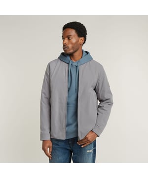 Raised collar. Zipper closure. Zip pockets at the front, caught in the seam. Adjustable cuffs, snap buttons. Side slits. Zip closure. Padded jacket Lofty is fully lined and offers a quilted design. A ribbed collar is combined with a zipper closure. The pockets that are caught in the seams offer a zipper closure as well. The double snap button at the cuff creates adjustability. 65% Recycled polyester, 35% Elastomultiester. Fine twill, soft touch