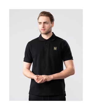 This piqué cotton top has its roots in sportswear, the textured fabric and classic cut mean it will make sense worn smart or casual.
Textured cotton piquéShort-sleeved polo shirtRib collar and cuffsTwo-button placketEmbroidered-edge Phoenix patch on chest
100% Cotton
71140354
