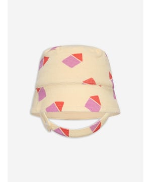 Introduce the Girls Beach Hut Sun Hat in Ivory, an elegant addition to your Baby_Girls' wardrobe! This enchanting hat is perfect for a stylish Holiday retreat. Here are its distinctive features:‚ Chic Design: This ivory sun hat flaunts a delightful beach-hut inspired print, rendering it a fashionable accessory. ‚Luxurious Comfort: Using premium materials, this hat promises exceptional comfort for your little one's vacation escapades.‚Uplift your Baby_Girls look! with the Girls Beach Hut Sun Hat in Ivory, a chic offering by The Bonnie Mob. Add this to your cart now for a stylish upgrade!