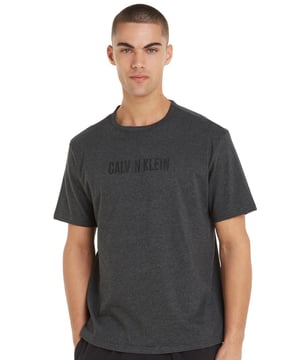 Complete your look with a designer flair with the Calvin Klein Intense Power t-shirt. Crafted in a cotton jersey material, this piece provides ultimate comfort with every wear. The crew neckline and short sleeves ensure a breathable fit to either layer in the cooler weather or wear by itself in the warmer seasons. To show off your favourite designer, flaunt the Calvin Klein logo print found at the centre front. Thanks to its simplistic style, this shirt is easy to pair with any outfit!

T-shirt
Cotton jersey material
Crew neckline
Short sleeves
Calvin Klein logo print on the chest
Minimal block design
Country of origin:Sri Lanka
Composition: 100% Organic Cotton
Listed in UK sizes
 Men's T-Shirt