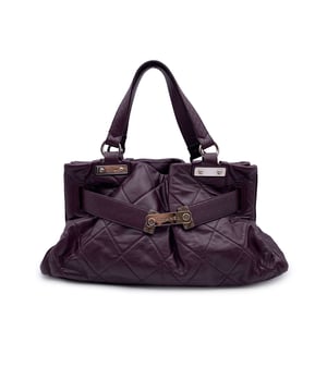 VINTAGE, RRP AS NEW
Chanel Limited Edition 'Paris-Londres' satchel bag. Period/Era: 2008. Silver metal hardware. Purple quilted leather. It features double leather handles, latch closure on the front and silver metal hardware. Gray satin lining. 1 side zip pocket and 2 side open pockets. 'Chanel - Made in Italy' tag inside. ity serial number inside  Condition Rating: A - EXCELLENTCondition Details: Gently used. Some wear of use on bottom corners. Please, look carefully at the photos and ask if you have any doubts.Measurements (cm):Depth: 17.8Height: 22.9Length: 45.7Other Details: Dustbag? NoKeys? NoBox? NoMeasurments:  width: 178 mm length: 457 mm height: 229 mm
