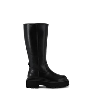 This KG Kurt Geiger Trick High Leg Boot features a black upper. There is a branded pull tab at the back of the boot. The sole is extra chunky with lift at the heel.