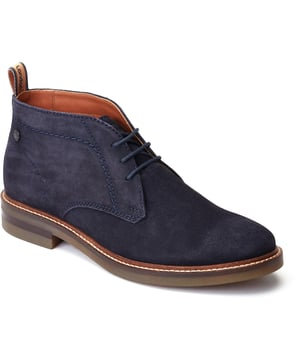 Stride in style with the Knebworth Men's Chukka Boot by Base London. Boasting premium leather uppers, a laid-back 3-lace closure, and a robust nylon pull tab for easy on/off, this Chukka boot features an Orthorlite insole for added comfort.
