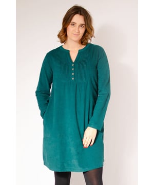 This elegant tunic dress is made in a pure cotton needlecord fabric and features a charming pintuck front with buttons. The high waist and relaxed fit make for a super comfortable and flattering fit.¬† The side pockets make it both stylish and functional. With its notched neck and long sleeves, this dress is perfect for cooler weather and can be effortlessly styled with tights and boots. Look and feel your best in this versatile and timeless piece.