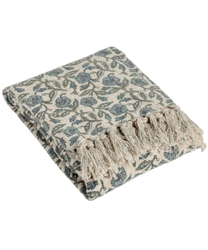 The Delphine throw transforms your home into a perfect sanctuary while inspiring your guests with its timeless charm. Featuring a classic floral design inspired by the Global Craft trend, this throw is printed onto a soft 100% cotton base. The reverse side is finished with plain cotton and a delicate tassel trim, making it an ideal addition for layering in any interior. Size: 130cm x 170cm.