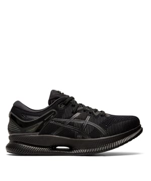 The ASICS MetaRide Men's Running Trainers are a pinnacle of innovation in the world of running shoes, designed to provide exceptional comfort, energy efficiency, and performance for male runners. These trainers showcase cutting-edge technology and thoughtful design to enhance your running experience. Here's an in-depth look at the key features of the ASICS MetaRide Men's Running Trainers:

Key Features:

 Guidesole Technology:  The standout feature of the MetaRide trainers is the innovative Guidesole technology. This rocker sole design helps reduce ankle flexion, leading to a more efficient running gait. It encourages smoother transitions from heel to toe, conserving energy and reducing fatigue during long runs.

 FlyteFoam Propel Midsole:  The FlyteFoam Propel midsole provides lightweight and responsive cushioning, offering both comfort and durability. It reduces the overall weight of the shoe while maintaining a high level of energy return, helping you maintain speed and efficiency.

 Gel Cushioning Technology:  These trainers feature Gel cushioning in the rearfoot to absorb shock upon impact, reducing the risk of impact-related injuries during your runs.

 AHAR Rubber Outsole:  The ASICS High Abrasion Rubber (AHAR) outsole offers excellent traction and durability, ensuring stability and grip on various surfaces.

 Seamless Construction:  The trainers have a seamless construction to minimize friction and reduce the risk of irritation or blisters, even during longer runs.

 Breathable Upper:  The upper of the shoe is constructed from a breathable mesh material that keeps your feet cool and well-ventilated during runs. This helps prevent discomfort and blisters.

 OrthoLite X-40 Sockliner:  The OrthoLite X-40 sockliner enhances cushioning, moisture management, and breathability. It can be removed if you prefer to use custom orthotics.