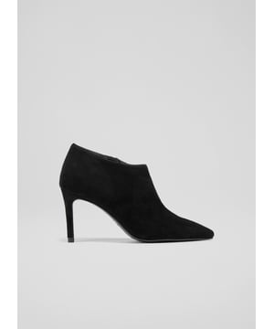 Sleek and sophisticated, our new Elle shoe boots work by day or night. Crafted in Spain from velvety-soft black suede, they have a pointed toe, a low cut to expose the ankle, an inside zip and an elegant 85mm stiletto heel. Try them with your favourite autumnal dresses, and they also slip perfectly under tailored trousers.