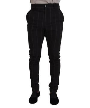 Marca: DOLCE & GABBANA  
Colección: MainLine  
Modelo: Pantalones Chino  
Color: Rayas Negras  
Material: 87% Lana Virgen, 9% Nailon, 2% Elastano, 2% Poliéster  
Hecho en Italia  
Detalles del logotipo  
Material: 87% Lana Virgen, 9% Nailon, 2% Elastano, 2% Poliéster