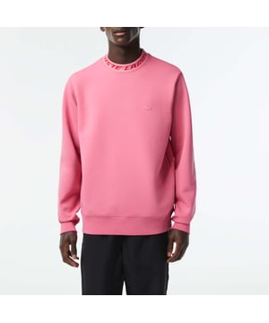 Men’s Lacoste Double Sided Logo Collar Sweatshirt. Round neck with jacquard logo: Little details that make a big difference. Chevron insert at neck: An iconic finishing touch. Rubber-feel crocodile: Stand out in Lacoste. Double-sided fabric: Soft and warm, perfect for every day.