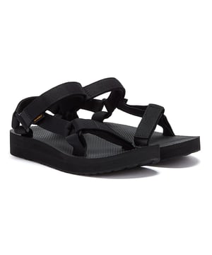 Splitting the difference between the Flatform Universal and the Original Universal, the Midform Universal is a people-pleaser. The upper, made from earth-friendly Unifi® Repreve recycled polyester webbing, is extremely durable and dries quickly after getting wet, whilst the Universal strapping system with its hook and loop fastening provides a secure fit and quick and easy on/off.