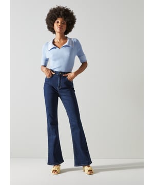 Our love for the Seventies naturally extends to our choice of denim. Our Cora jeans are a flared design which speaks to the decade's iconic trouser shape. Crafted from super-soft indigo denim, they sit on the waist have a zip fly, side pockets, back pockets and a slim fit with a flared hemline. Wear them with a stylish silk blouse or one your favourite knits.