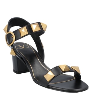 Valentino Garavani Roman Stud calfskin sandals with maxi studs
- Maxi studs (18 x 18 mm) with antique brass finish
- Wide leather-covered heel
- Heel height: 60 mm
- Made in Italy