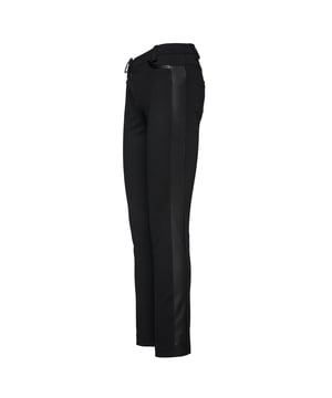 Black long fitted jeggings. Faux leather panels at the sides. Two faux pockets in the front with black faux leather detail. Two patch pockets at the back. 4cm waistband in the same fabric with belt loops. Zip fastening in the front, tone on tone, with a black faux leather button. Vertical seam in the front. Extra fabric at the hem allows it to be let down by up to 3cm.  Length for size 38: 97cm.