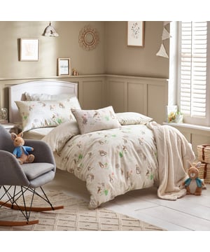 Step into the world of Beatrix Potter with the Peter Rabbit™ Classic duvet cover set. The classic print features enchanting illustrations paying tribute to his love of carrots and Peter's mischievous adventures. A tonal polka dot print covers the reverse, giving you two looks in one! A timeless design, making it perfect for any modern home.