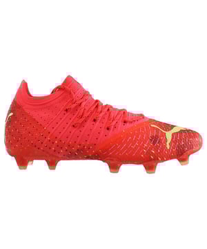 Take your game to the next level with the Puma Future 1.4 FG/AG Men's Red Football Boots, a dynamic and high-performance choice for the modern footballer. Engineered to provide superior agility and precision on both firm ground (FG) and artificial ground (AG) surfaces, these boots will help you leave your mark on the field.

Key Features: 

 Striking Red Design:  The Puma Future 1.4 Men's Football Boots feature a bold red colorway that demands attention and reflects your passion for the game. The sleek design exudes confidence and style as you dominate the pitch.

 Versatile FG/AG Soleplate:  With a hybrid soleplate designed for firm ground and artificial ground surfaces, these boots offer exceptional traction and stability on various playing fields. You can perform at your best, no matter the pitch conditions.

 Secure Lacing System:  The boots are equipped with a secure lacing system, ensuring a snug and personalized fit that enhances responsiveness and control during quick movements and precise plays.

 Comfortable Upper:  Crafted with premium materials, the upper of these boots provides a comfortable and soft feel around your foot. The material enhances ball touch and control, giving you an edge in passing, shooting, and dribbling.

 Adaptive NETFIT Technology:  Puma's innovative NETFIT lacing system allows for customizable lacing patterns, adapting to your foot shape and playing style for a personalized fit and enhanced support.

 Lightweight and Agile:  These boots are designed with a focus on lightweight performance, allowing you to move with agility and speed on the field.

 Sock-Like Collar:  The boots feature a sock-like collar that wraps around your ankle, providing a secure and supportive fit. This design reduces the risk of unnecessary foot movements inside the boot and helps prevent potential injuries.
