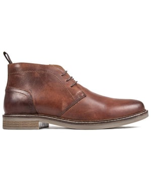 Botines bajos con cordones Thomas Crick Dallas de color marrón medio para hombre con parte superior de cuero de primera calidad. Puntera redonda y sistema de cordones tipo sillín. Estos zapatos estilo Oxford tienen un forro de cuadros. plantilla acolchada. Tirador textil en el talón. ribetes de puntadas en contraste y suela de bloque de color sintético con tacos.