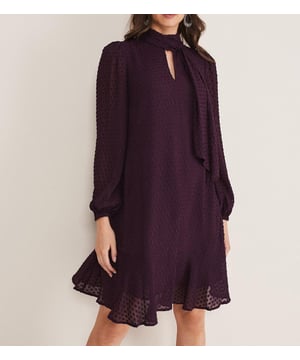• 100% Viscose Woven Lining: 100% Polyester • Tie neckline and long sleeves. Swing style/A line